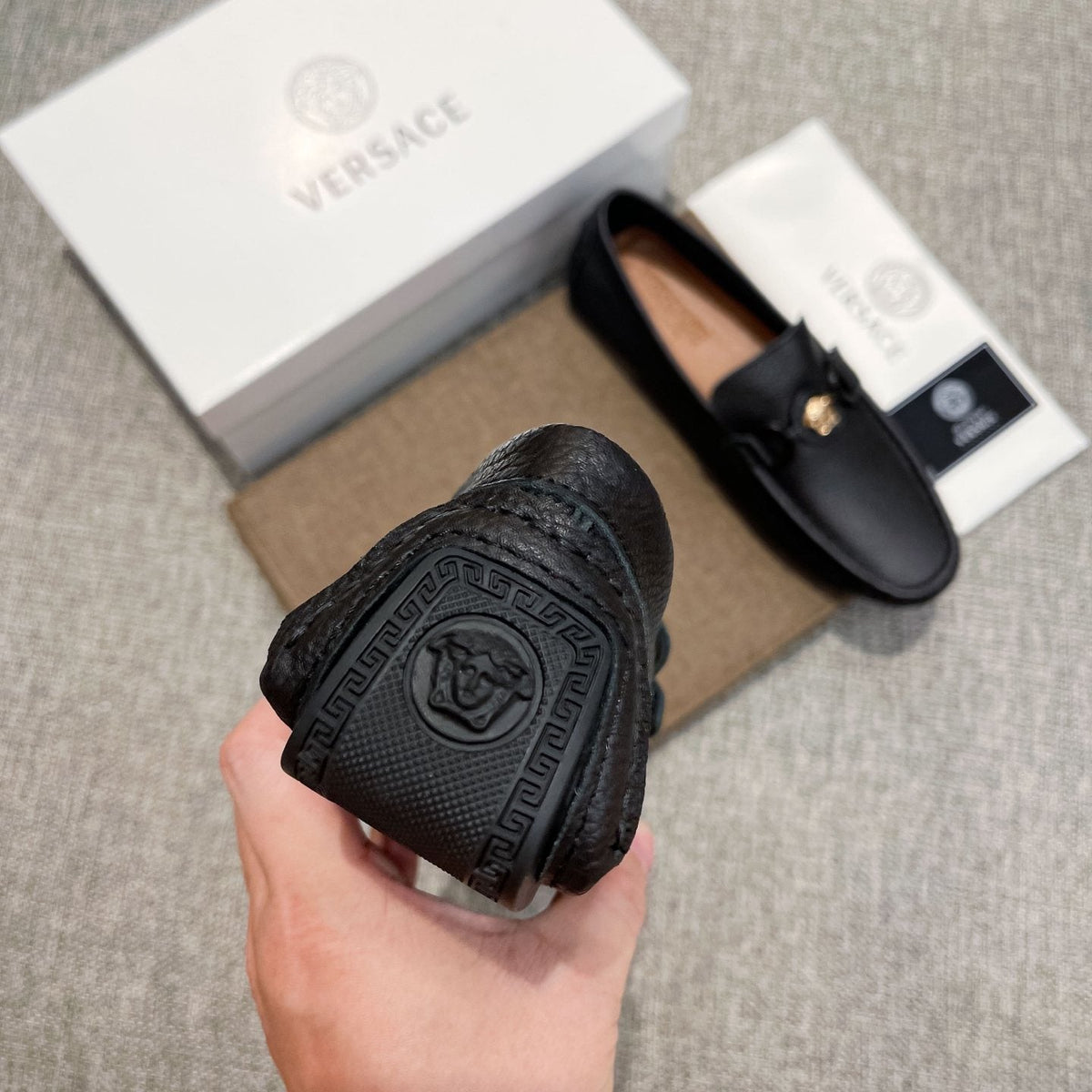 Versace Black Gold-Emblem Slip-On Loafers — detail