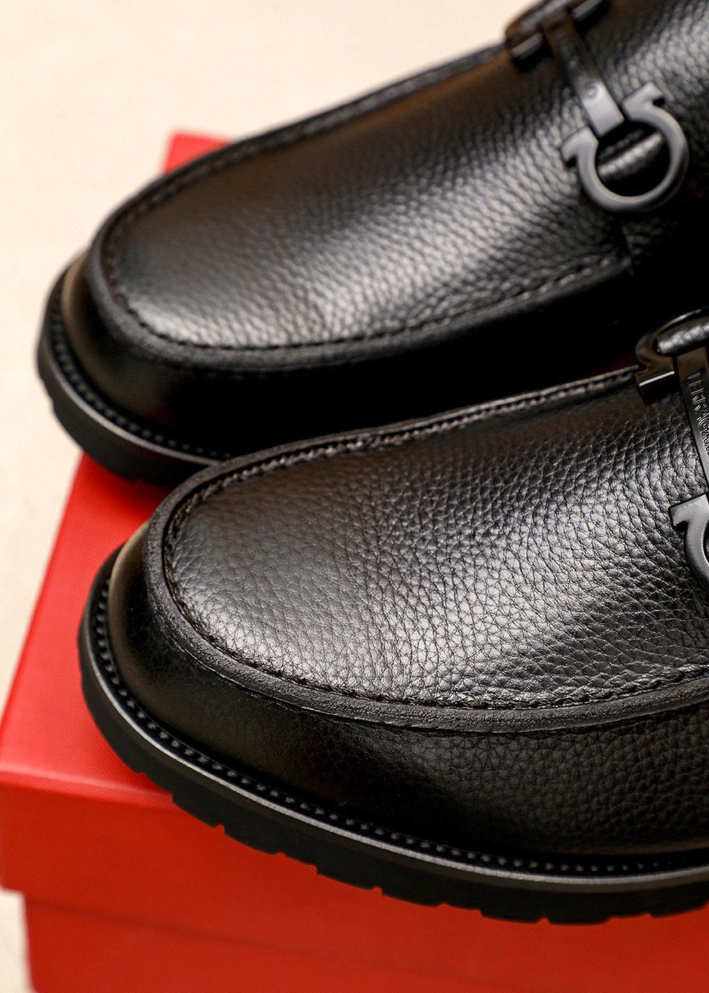Ferragamo Black Textured Leather Slip-On Loafers — detail