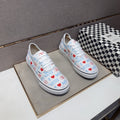 Vans White Graphic Low-Top Sneakers — front