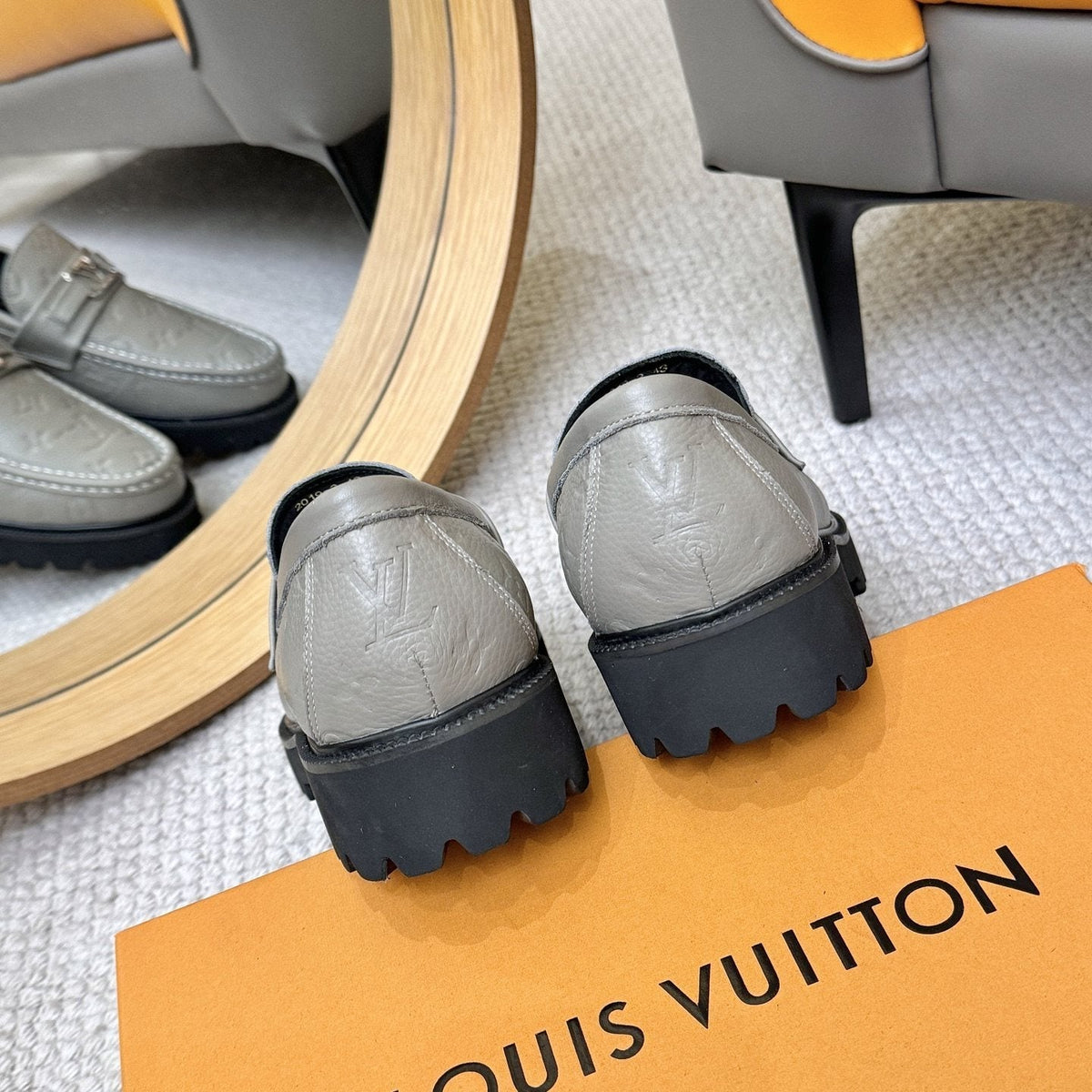 Louis Vuitton Embossed Lug Sole Loafers — side