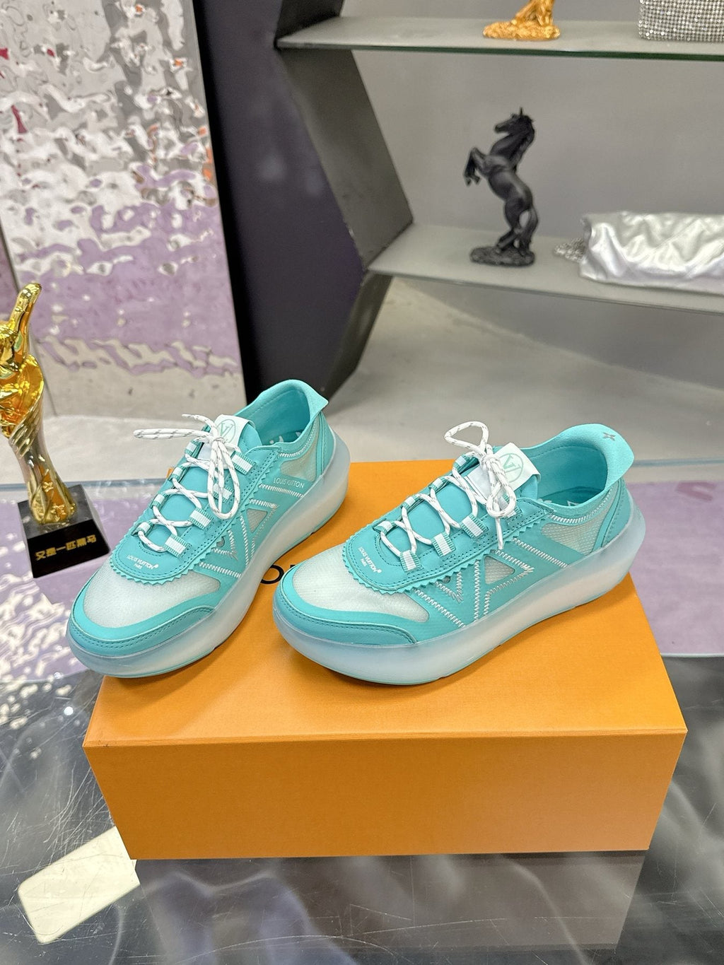 Louis Vuitton Aqua Blue and White Low-Top Sneakers — front