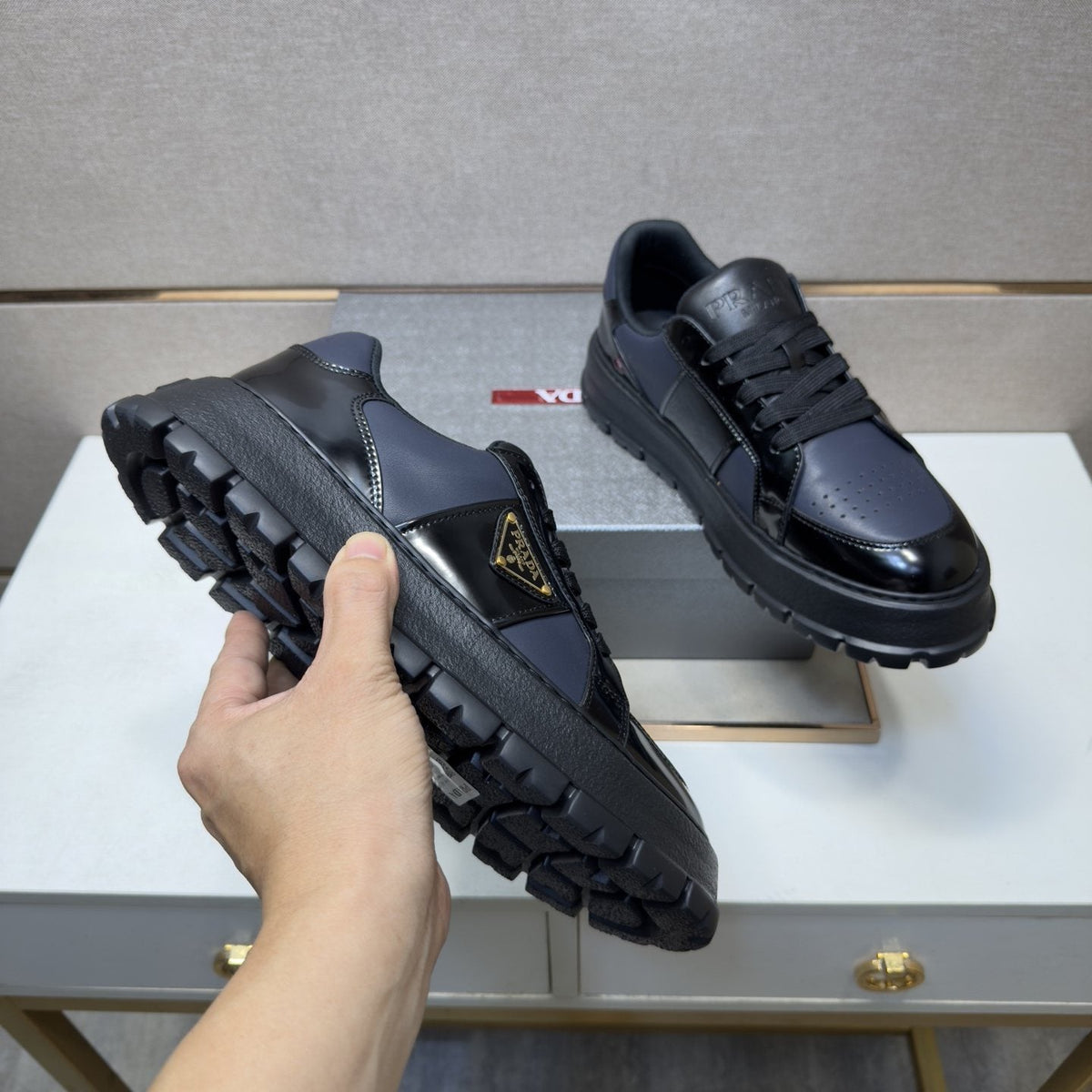 Prada Paneled Low-Top Sneakers — model