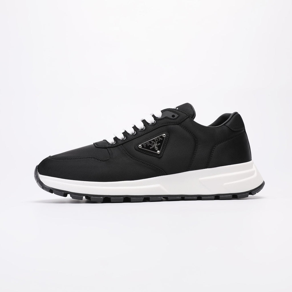 PRADA Navy Triangle Badge Sneakers — side