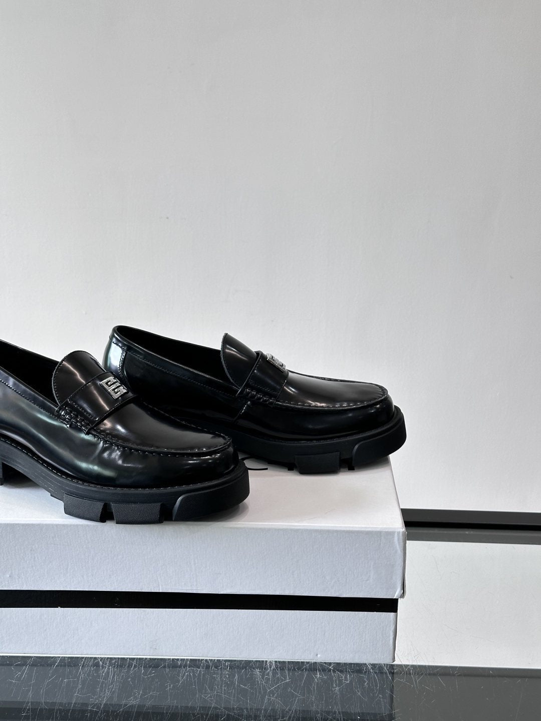 Givenchy Metal-Accent Lug Sole Loafers — side