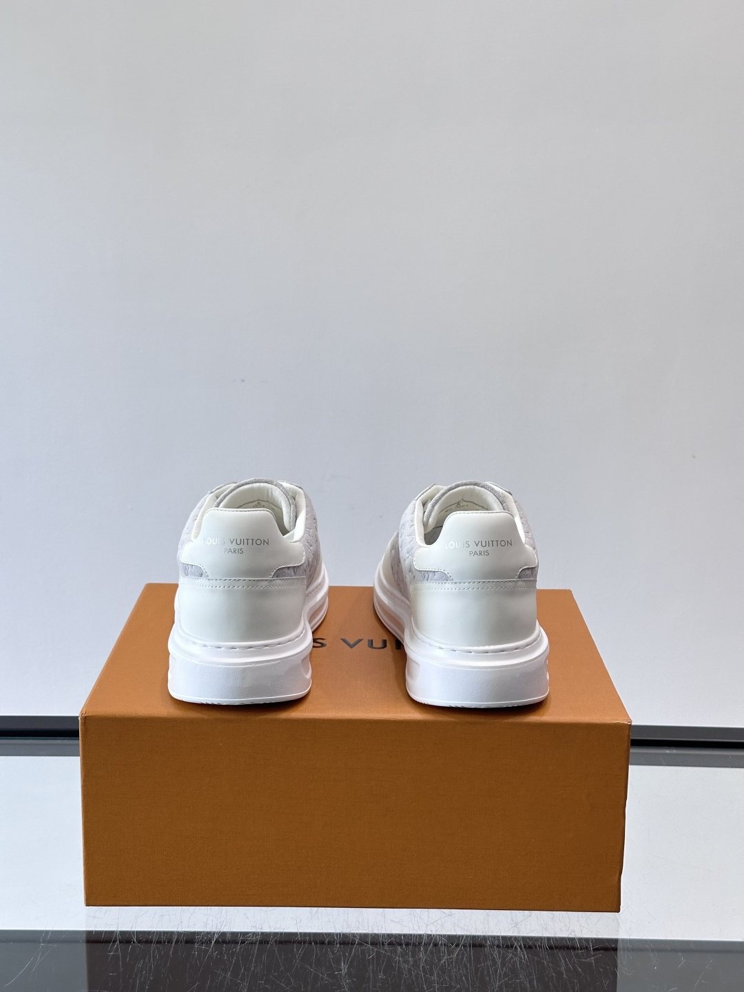 Louis Vuitton Embossed Low-Top Sneakers — back