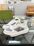 Gucci Black and White Low-Top Sneakers — front