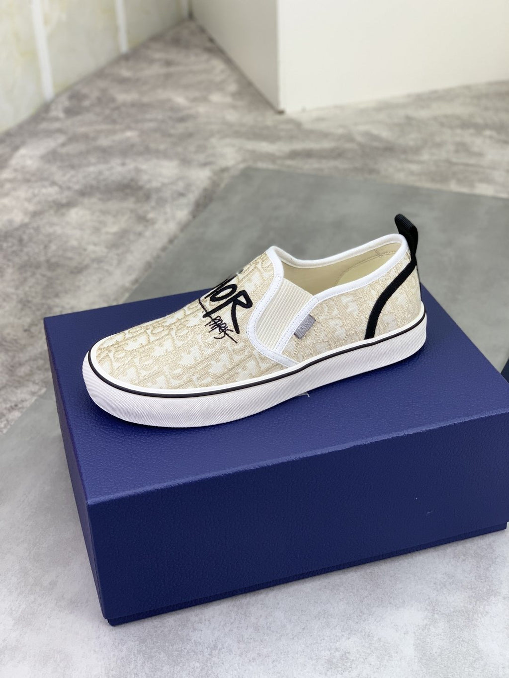 Dior Ivory Canvas Slip-On Sneakers — side