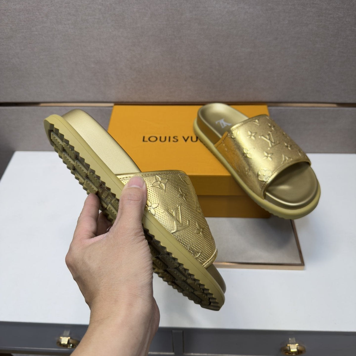 Louis Vuitton Embossed Metallic Slide Sandals — detail